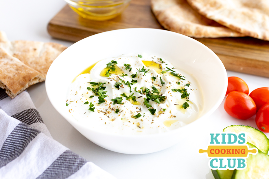 labneh in a bowl served with pita bread