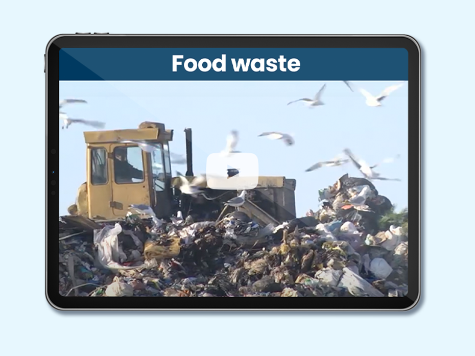 Bulldozer pushing garbage in a waste management plant. Text on image: Food waste