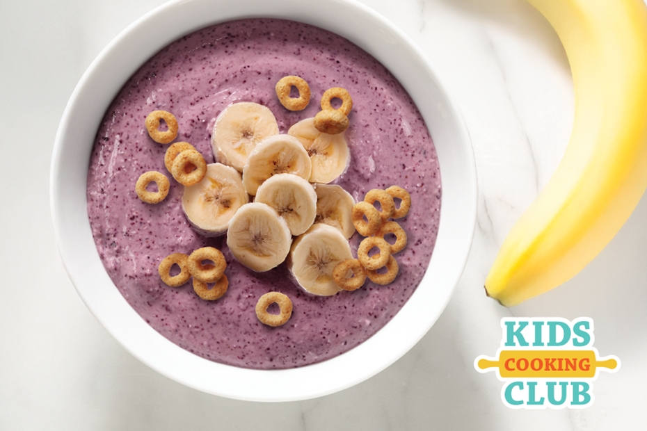 blueberry banana smoothie bowl with cheerios on top