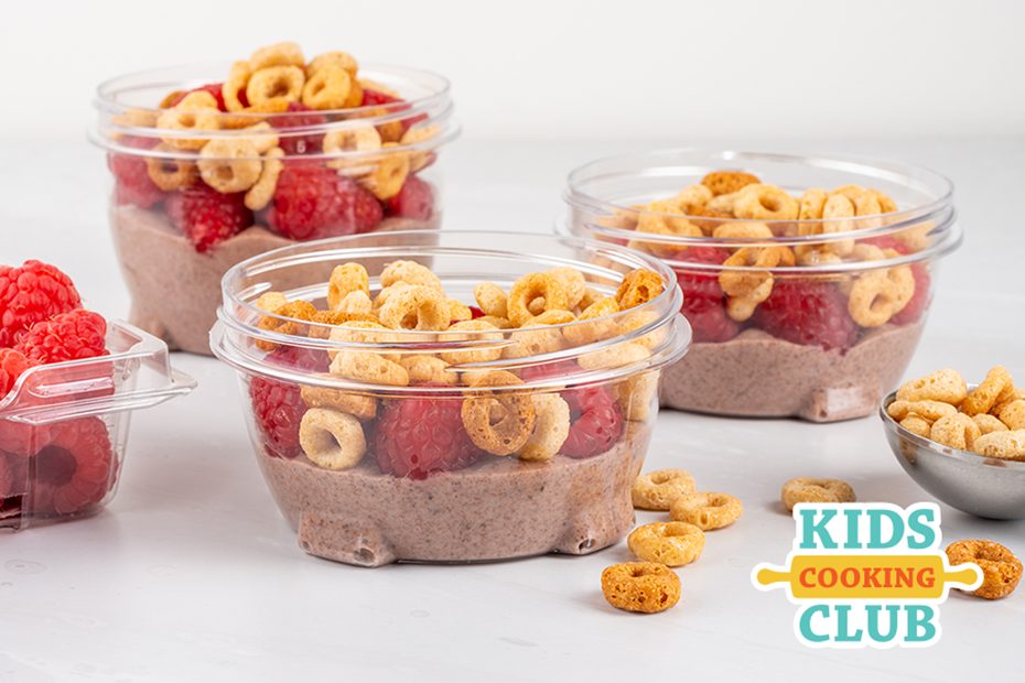 3 containers with chocolate yogurt and raspberry parfaits with cereal