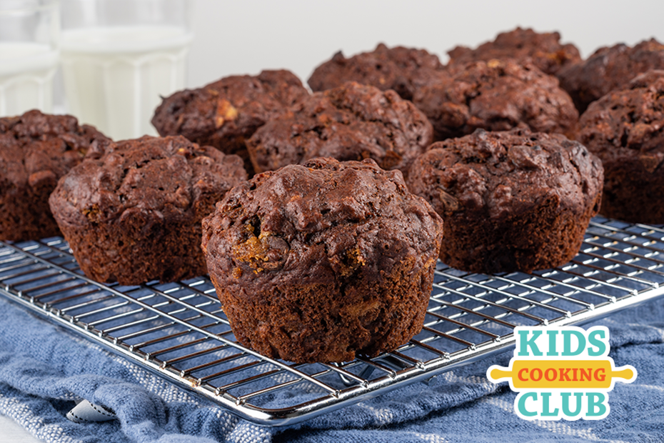 chocolate banana bran muffins on a cooling rack in kitchen